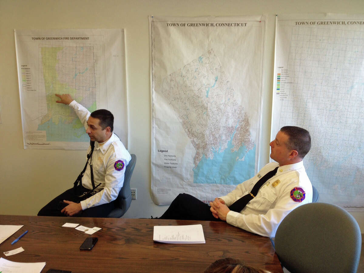 Deputy Chief Thomas Zack, left, and Assistant Chief Robert Kick discuss Fire Department response times at a press briefing outlining upcoming initiatives.