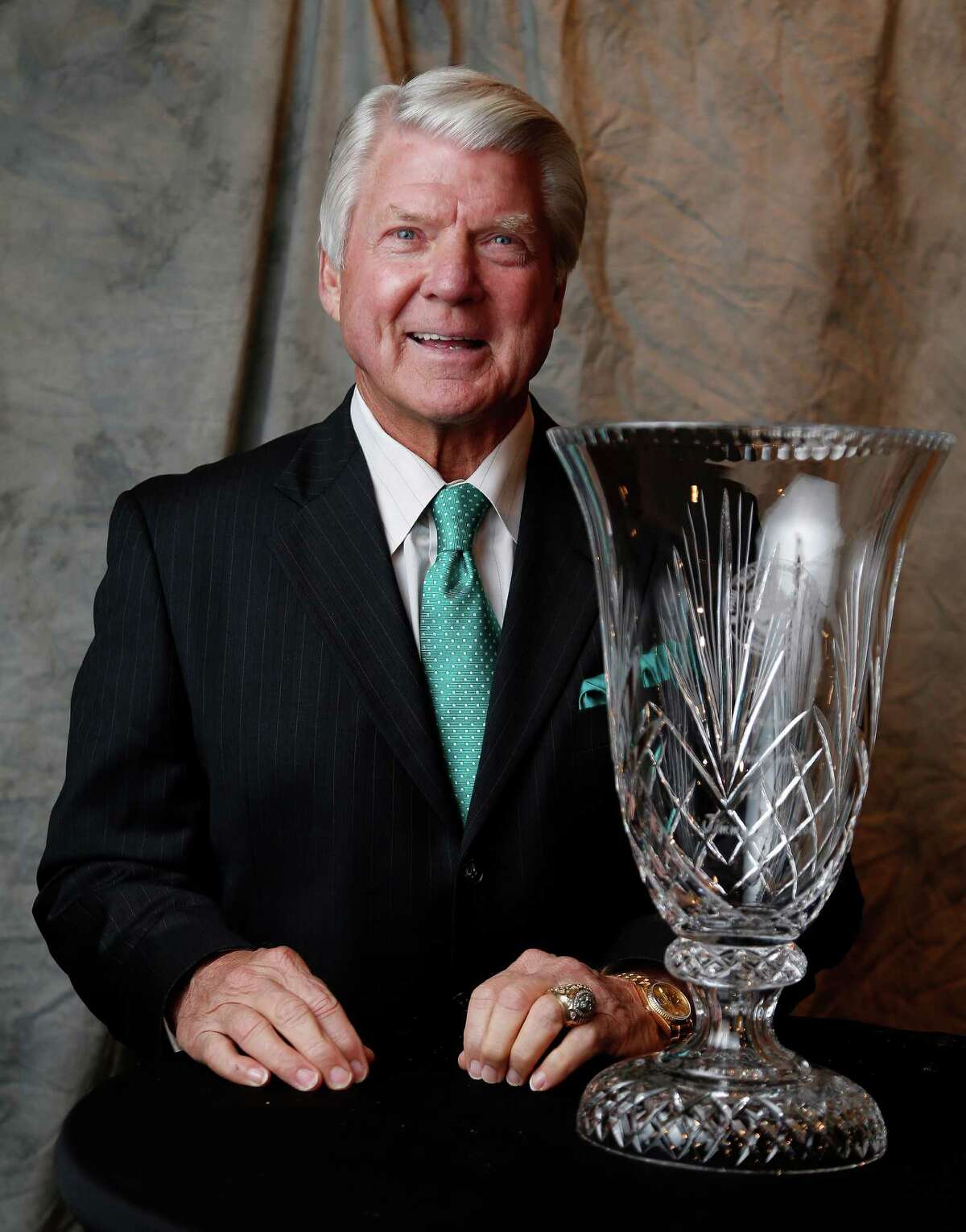 Jimmy Johnson photographed with the 2015 Lifetime Achievement Award before the start of the 2015 Paul "Bear" Bryant Awards at the Hilton Americas, Wednesday, Jan. 14, 2015, in Houston. The Lifetime Achievement Award recognizes excellence in coaching during a career.