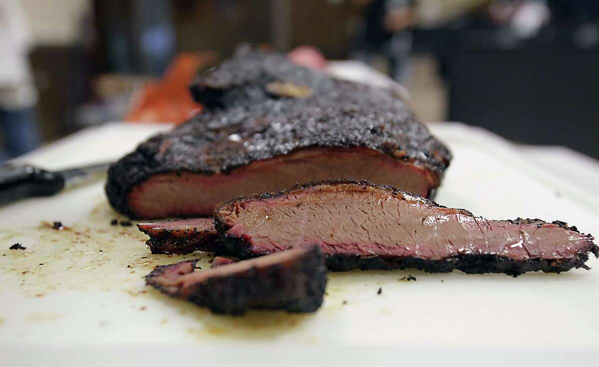 Slices of a smoked brisket during Foodways Texas and Texas A&M University's Camp Brisket.