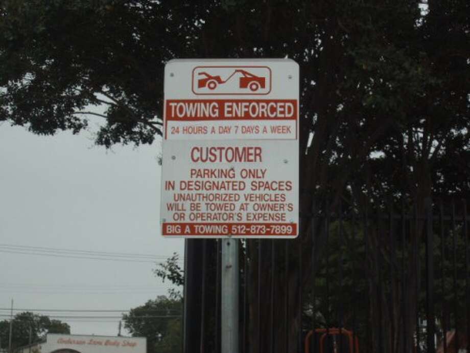 Potentially illegal towing sign examples Chron