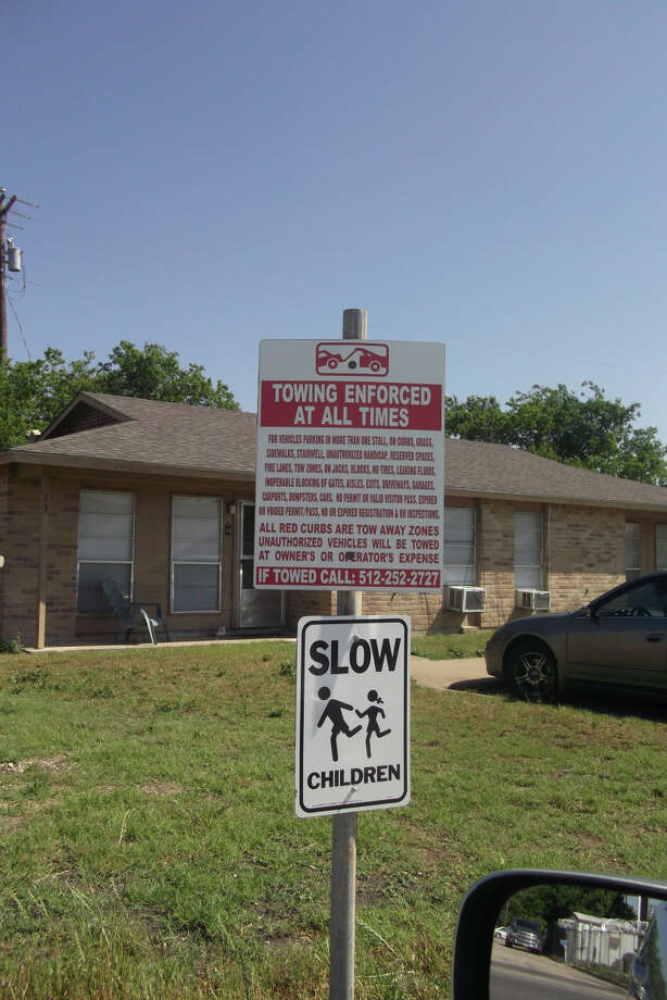 Potentially illegal towing sign examples Chron
