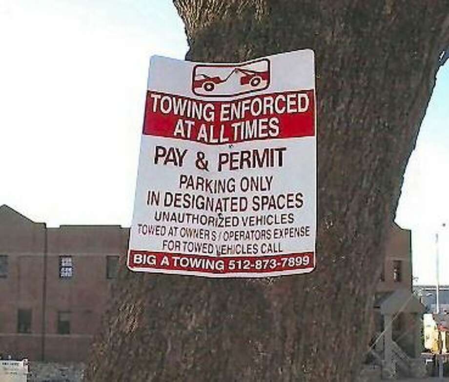 Potentially illegal towing sign examples Chron