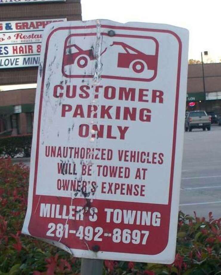 Potentially illegal towing sign examples Chron