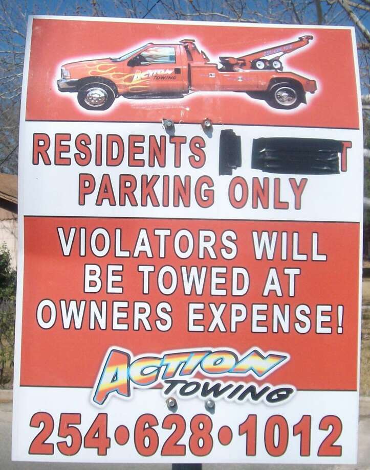 Potentially illegal towing sign examples Chron
