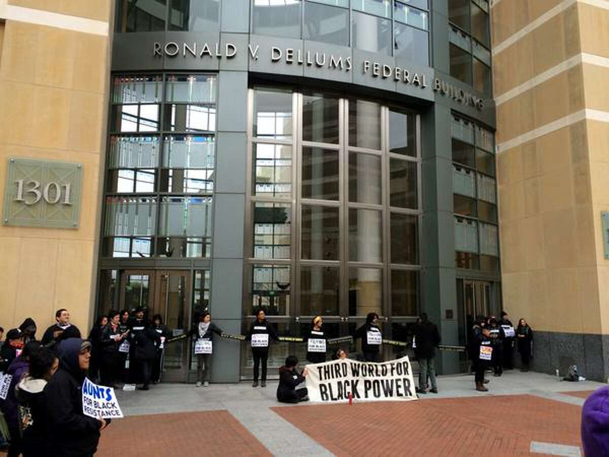 Protesters blocked the entrance of the Federal Building in Oakland on Friday morning.