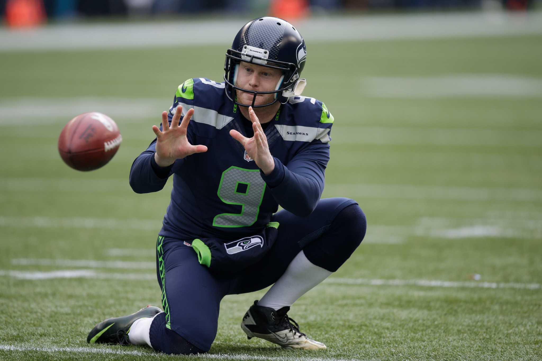 Kicker Steven Hauschka (4) and holder Jon Ryan (9) of the Seattle Seahawks  celebrate his game-winning field goal in a 23-20 overtime loss to the Seattle  Seahawks on Sunday, September 29, 2013