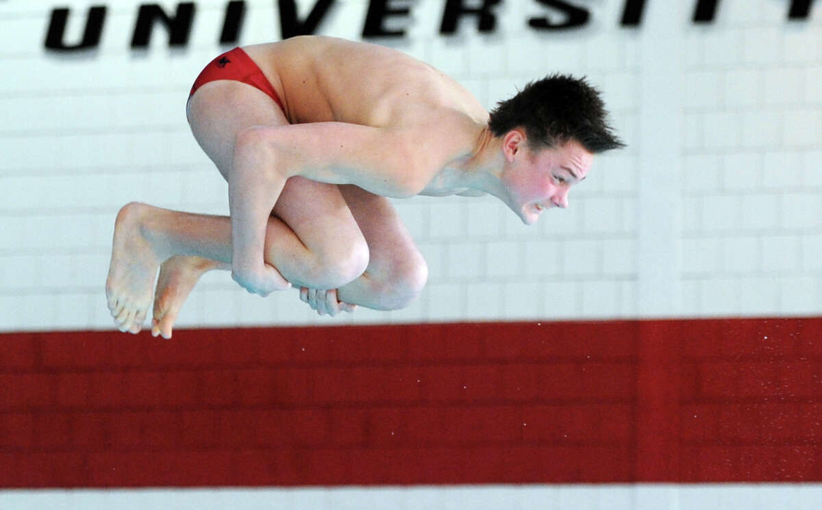 Greenwich diver Sergei Shaw competes during a meet with Fairfield Prep Saturday, Jan. 17, 2015, at the Fairfield University Rec Plex pool.