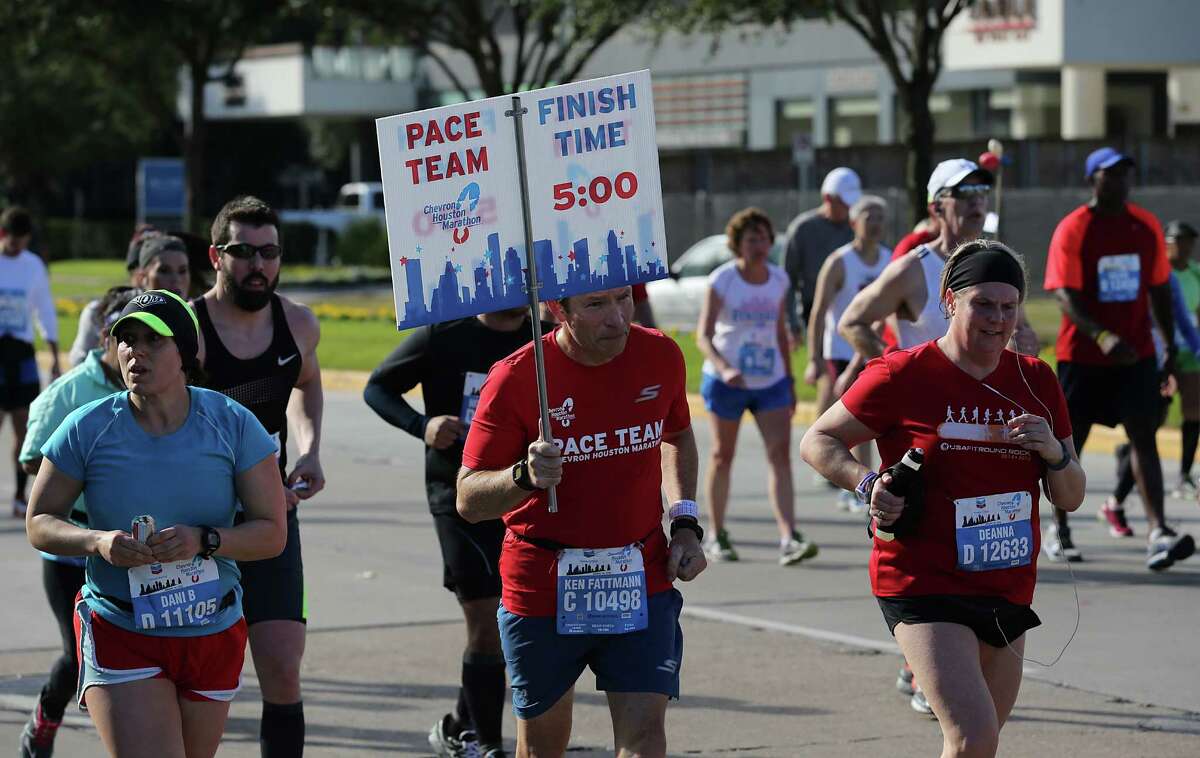 Runners on Post Oak Blvd. on mile 15 in the Chevron Houston Marathon, on Sunday, October, 18, 2014 in Houston, TX.