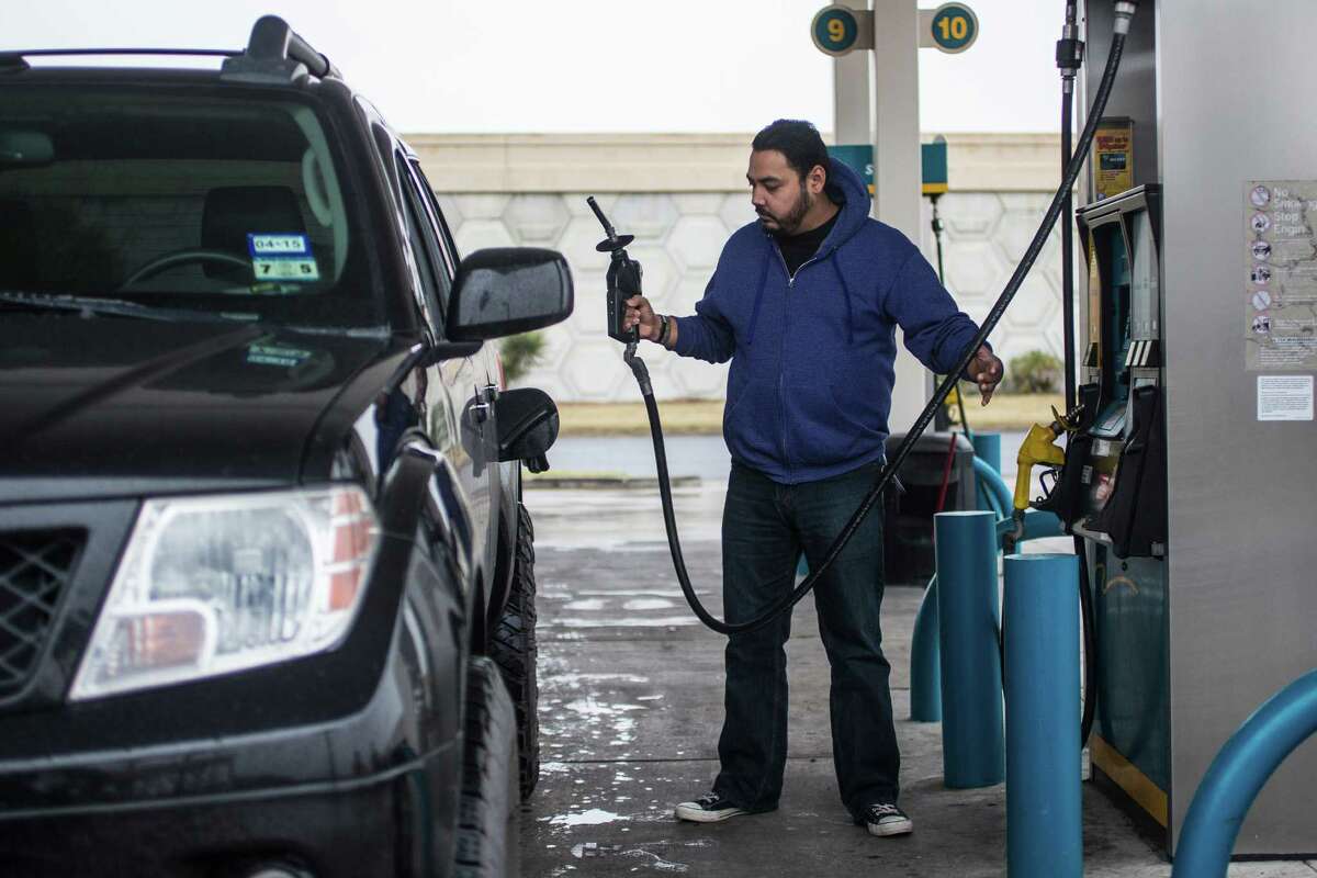 Felix Coronado fuels his vehicle with regular unleaded gasoline in Corpus Christi last week. Those hitting the road on an intrastate trip will find low gas prices throughout Texas. The state’s gas-price average of $1.86 puts it among the Top 10 least expensive in the nation, AAA Texas-New Mexico spokesman Doug Shupe said.