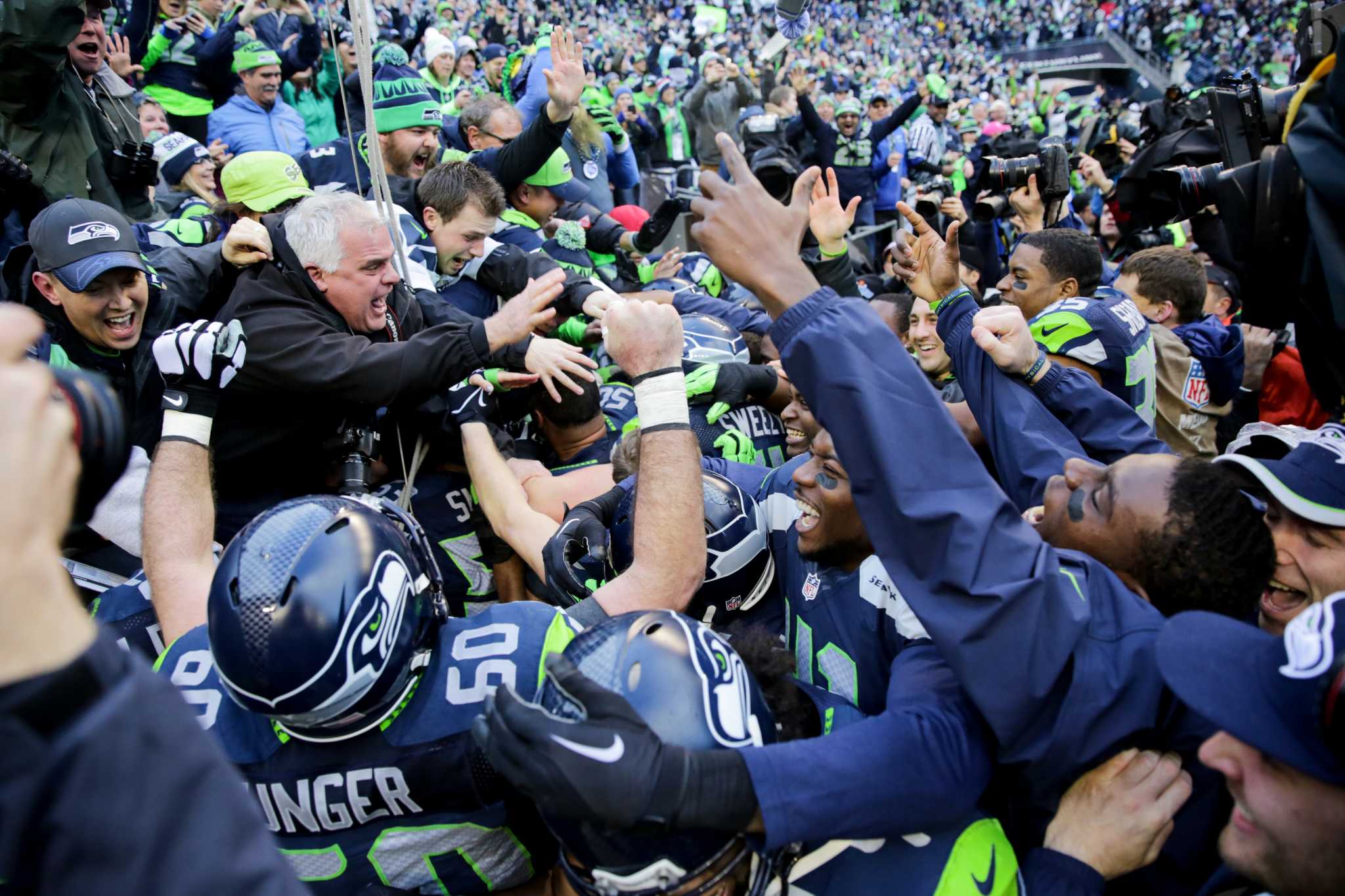 Seahawks fan rejects $20K, will give famed football back to Kearse