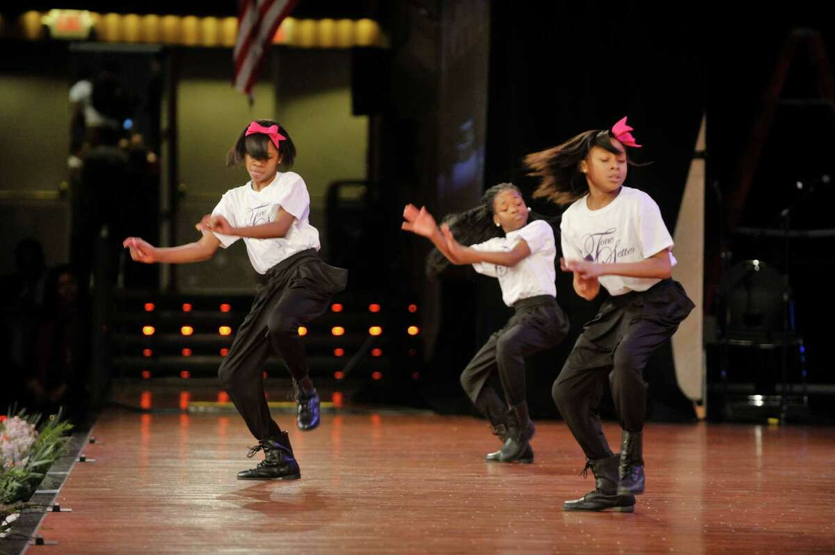 Members of the Tone Setters Step Team from Albany perform during the Dr. Martin Luther King, Jr. Holiday Memorial Observance at the Empire State Plaza Convention Center on Monday, Jan. 19, 2015, in Albany, N.Y. (Paul Buckowski / Times Union)