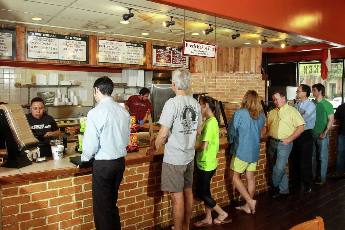 Customers lined up to put in orders at The Brisket House in west Houston.