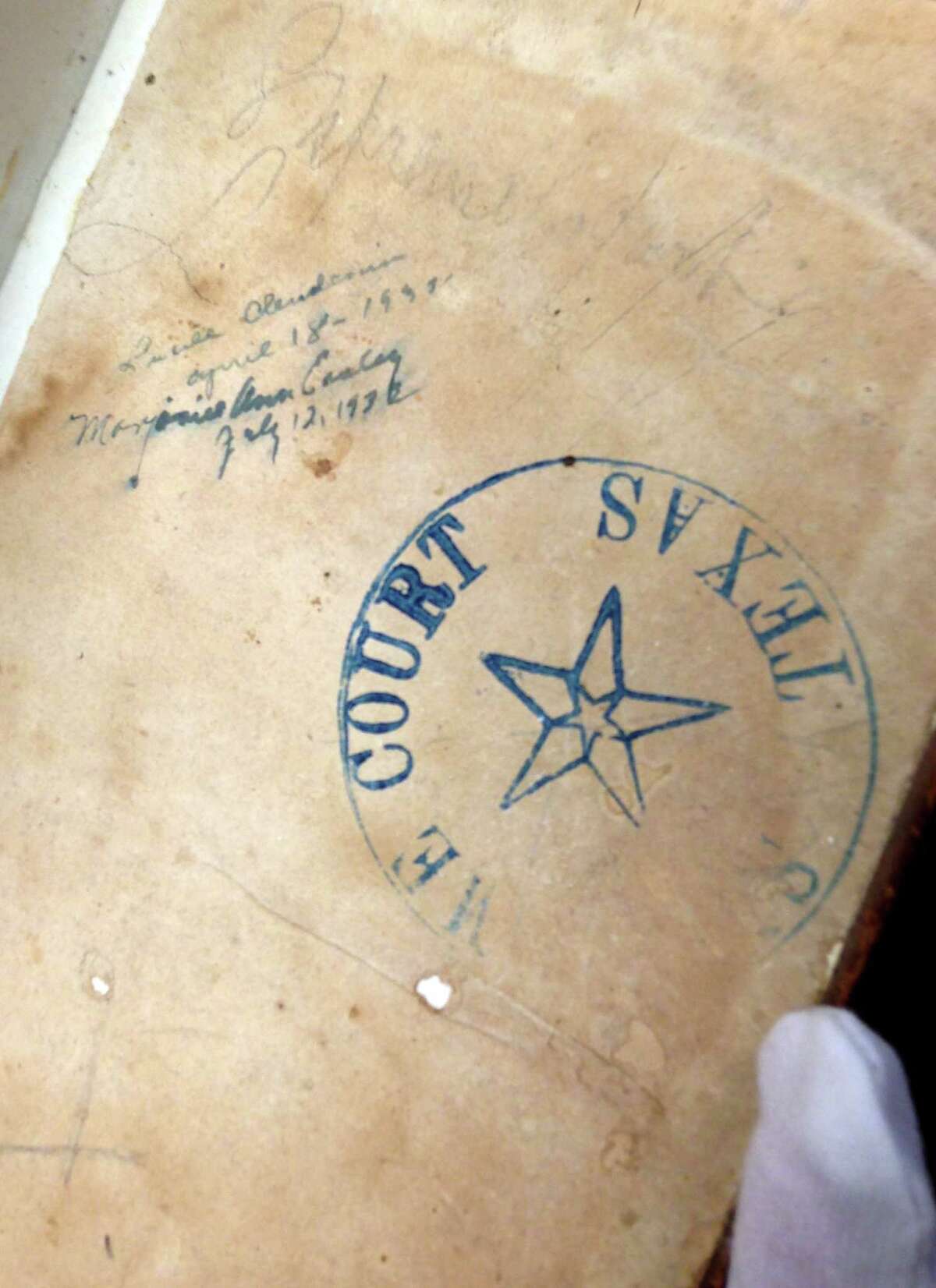 An old Texas Supreme Court stamp is among the markings in what is known as the Sam Houston Bible.