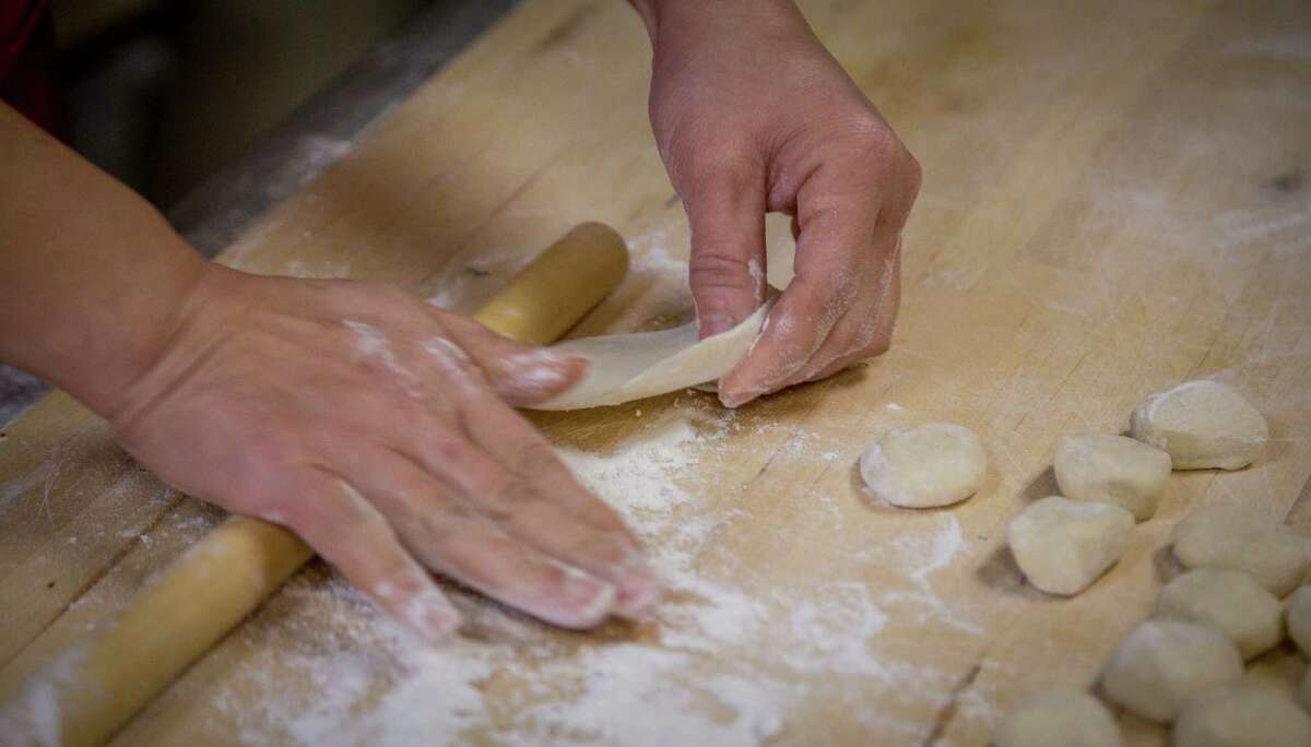 Dumpling dough being rolled out at China North Dumpling in San Francisco, Calif. on January 20th, 2015.