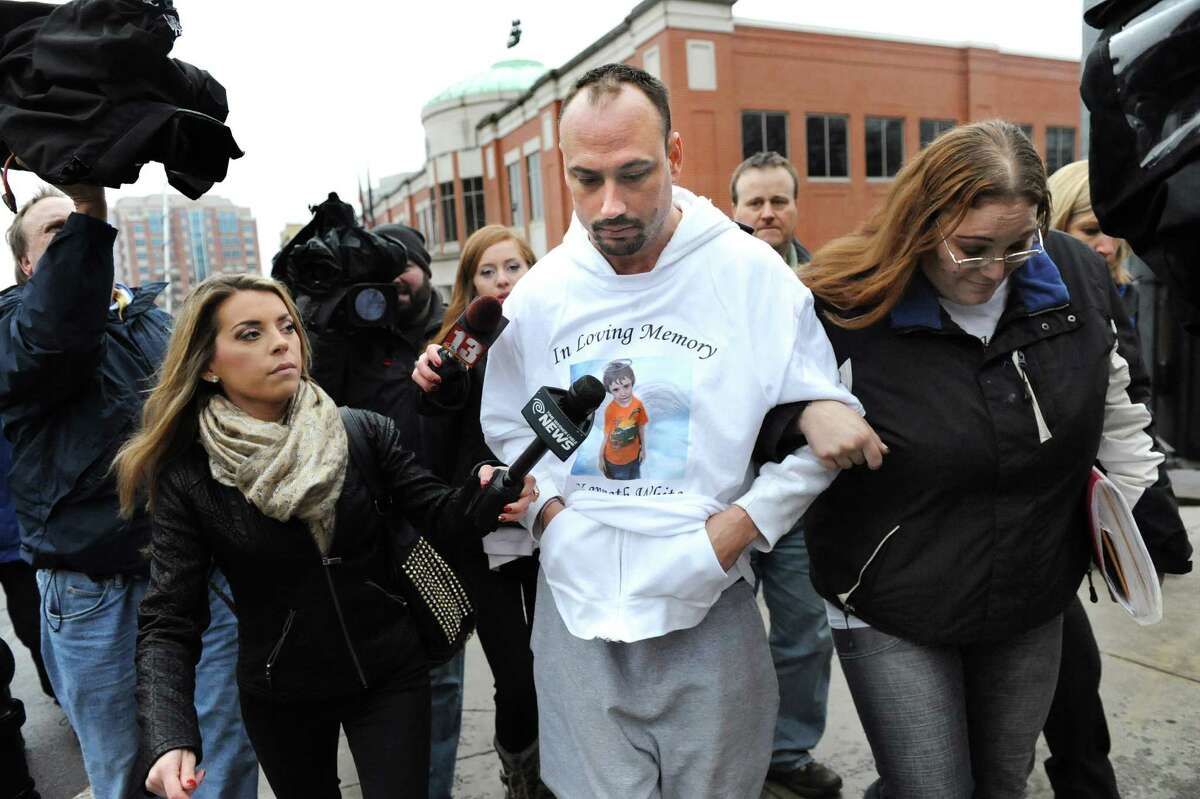 Jayson White, center, was denied custody of his two daughters, ages 5 and 4, on Tuesday Dec. 23, 2014, at Albany County Family Court in Albany, N.Y. White is the father of the late 5-year-old slaying victim Kenneth White, and the girls are Kenneth's sisters. (Cindy Schultz / Times Union archive)