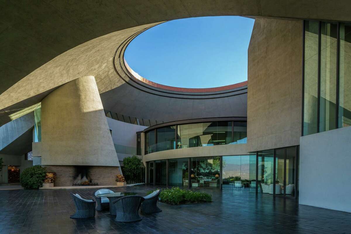 Price for Bob Hope's 'UFO House' cut in half