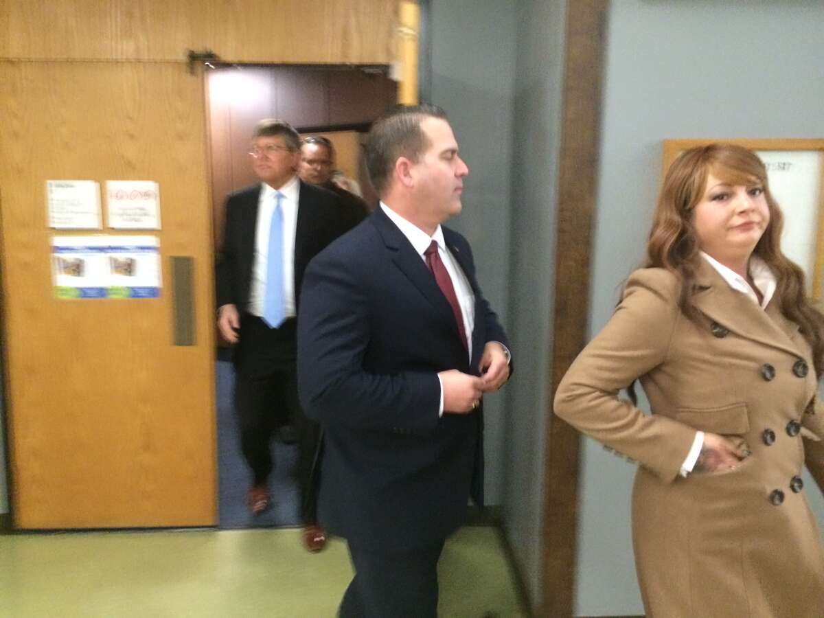 Former Pinole police Cmdr. Matthew Messier leaves a Hayward courtroom after his sentencing on Jan. 21, 2015.