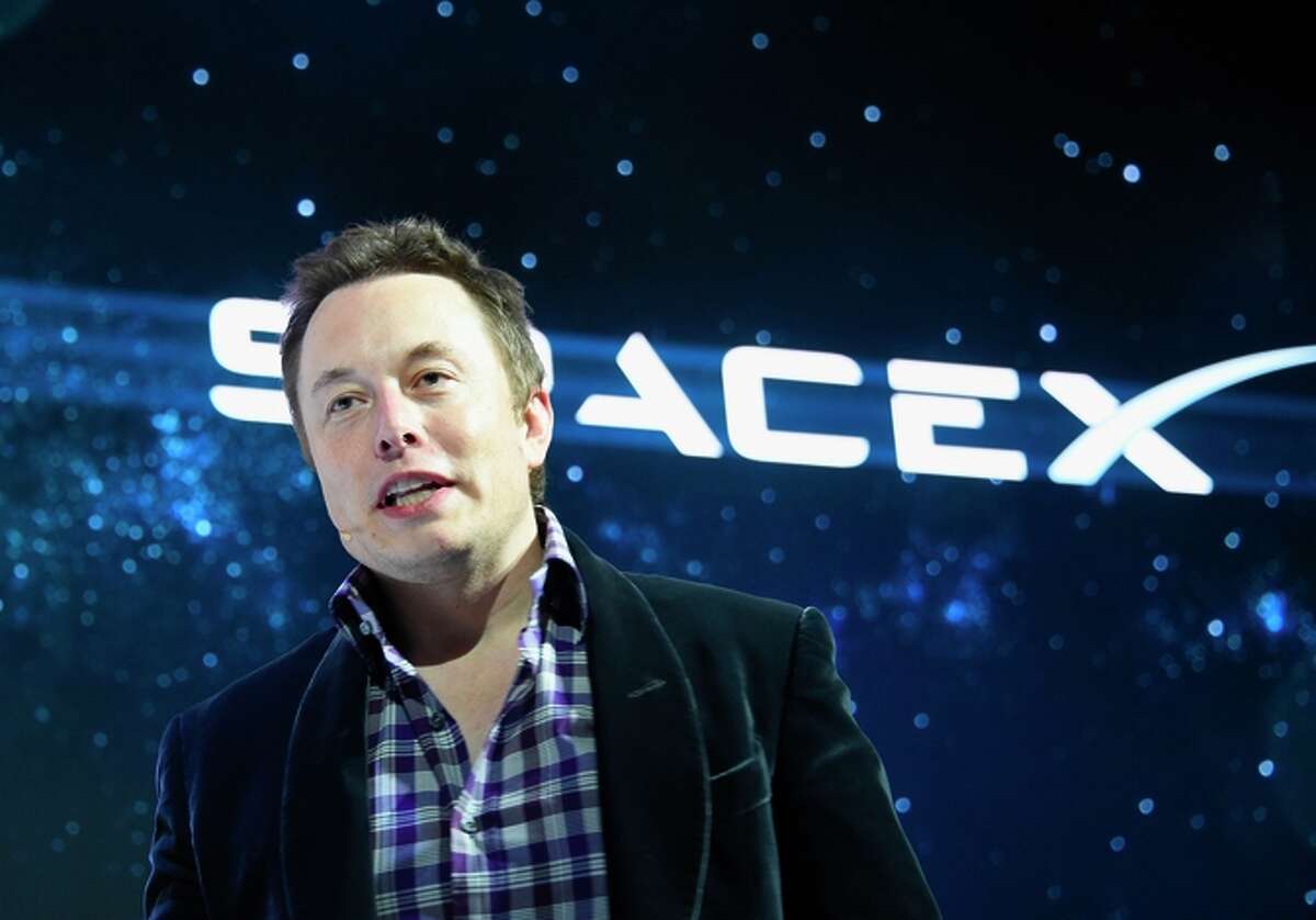 (FILES)This May 29, 2014 file photo shows Elon Musk as he unveils SpaceX's new seven-seat Dragon V2 spacecraft, in Hawthorne, California. The private space exploration firm SpaceX said January 20, 2015 it had secured a $1 billion investment that could help founder Elon Musk's plan to build a satellite Internet network. The latest round of funding comes from Google and the financial firm Fidelity, which will own some 10 percent of the company. The statement offered no details on plans for the funds, but Musk has said he wants to build a network of satellites to deliver the Internet around the globe. AFP PHOTO / ROBYN BECK / FILESROBYN BECK/AFP/Getty Images