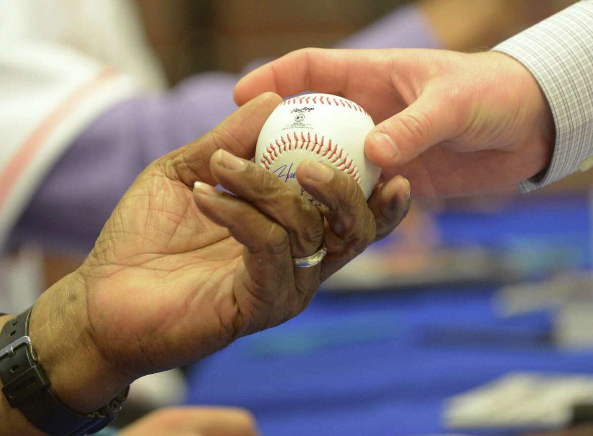 Houston Astros players shop with kids at Academy during Astros-Caravan stop