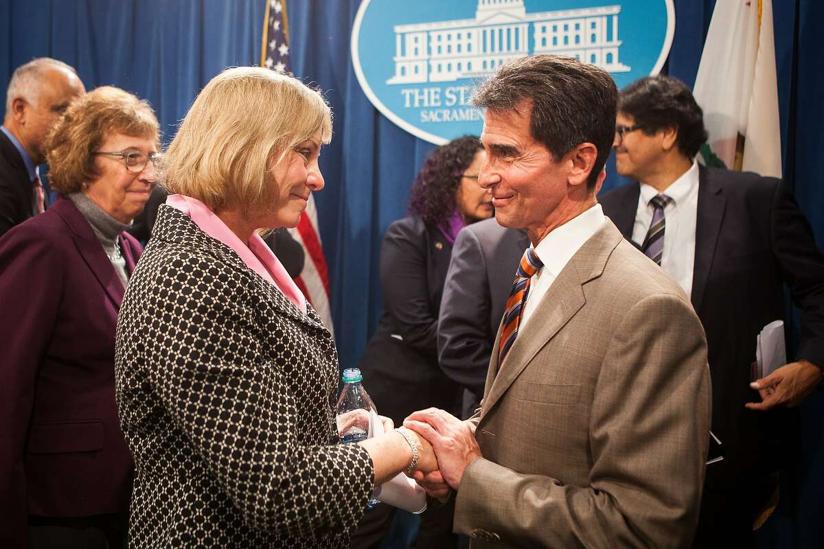Brittany Maynard's mother, Debbie Ziegler, left, is thanked by Senator Mark Leno, right, after a press conference introducing SB 128, "The End-of-Life Options Act" at the State Capitol in Sacramento, California, January 21, 2015.