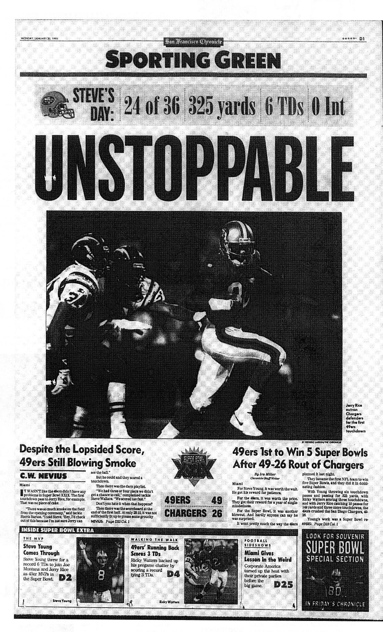 San Francisco 49ers wide receiver Jerry Rice, right, celebrates a first  half touchdown with cornerback Deion Sanders, center, as quarterback Steve  Young (8) looks on at the Georgia Dome in Atlanta on