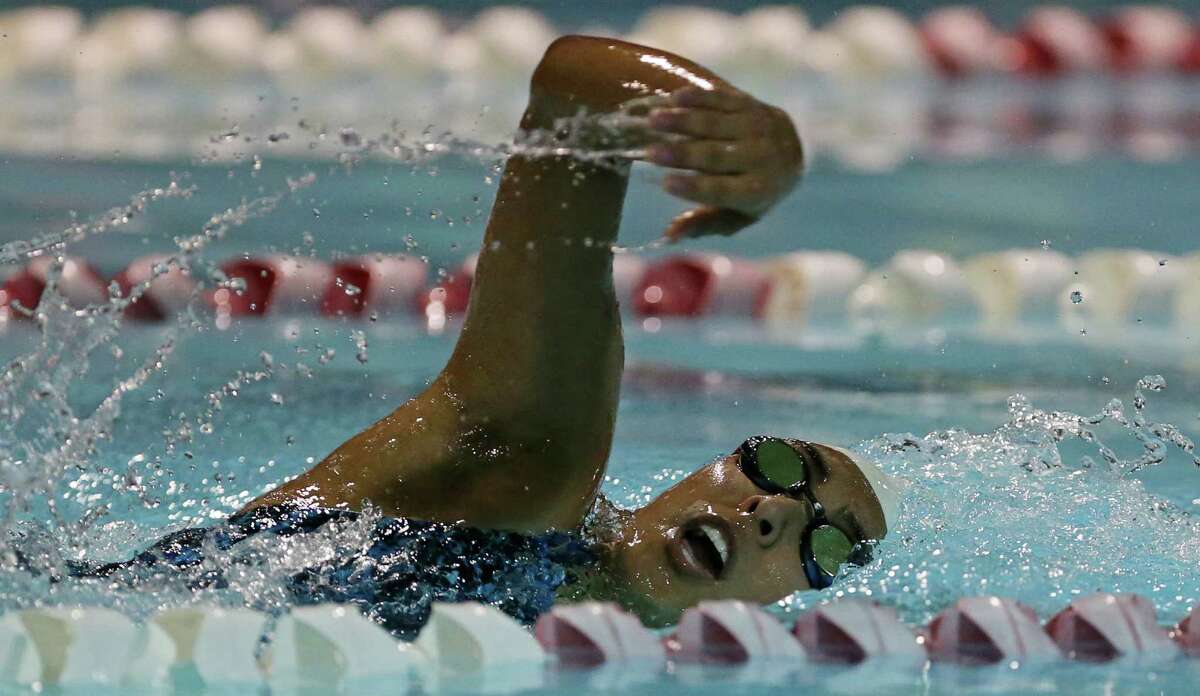 Lanier's Elisa DeHoyos competes in the women's 100-yard freestyle Thursday Jan. 22, 2015 at the San Antonio Natatorium. DeHoyos finished first with a time of 1:14.70