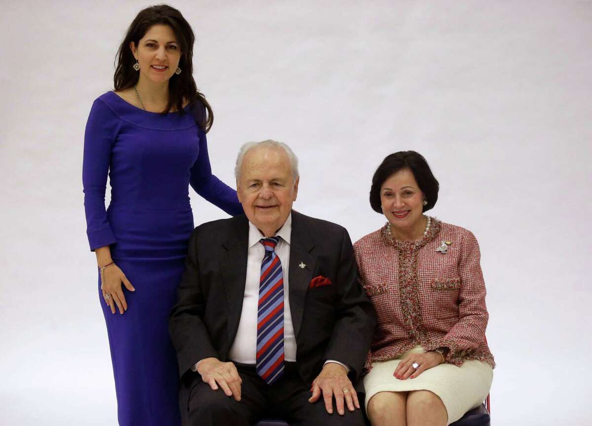New Orleans Saints owner Tom Benson and his wife, Gayle Benson (right), pose for a photo with his granddaughter and Pelicans co-owner Rita Benson LeBlanc at the Pelicans NBA basketball media day last September.