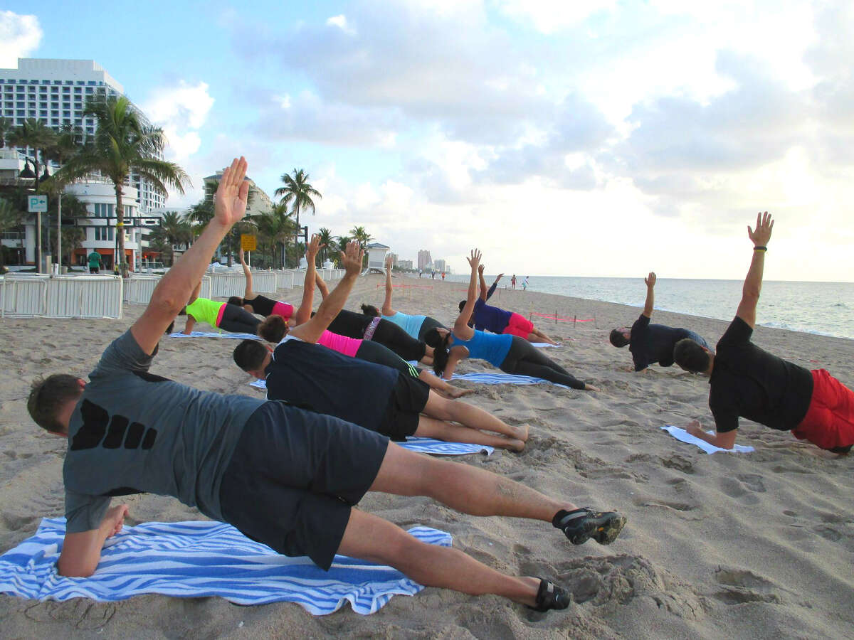 Fit-minded folks warm up for the W Fort Lauderdale’s Beach Boot Camp circuit.