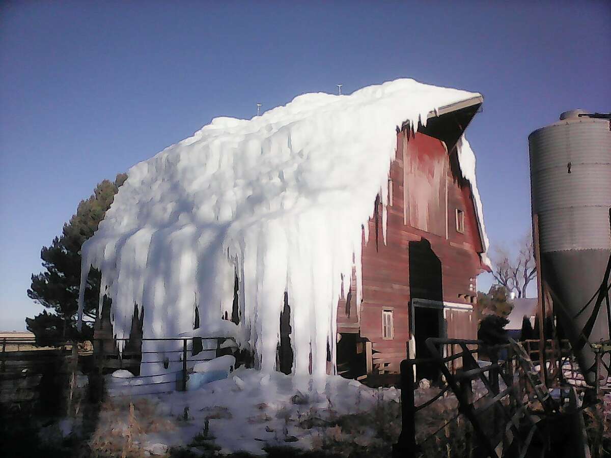 WELL, THAT'S ONE WAY TO BRING DOWN THE HOUSE: A massive ice cap covers Bruce and Carol Anderbery's barn in rural Axtell, Neb. The couple wanted to make room for a new building on their farm, but didn't want to pay for demolishing the old barn. So they thought pouring huge amounts of water on top of the structure and letting it freeze would do the trick. So far, the walls are holding.