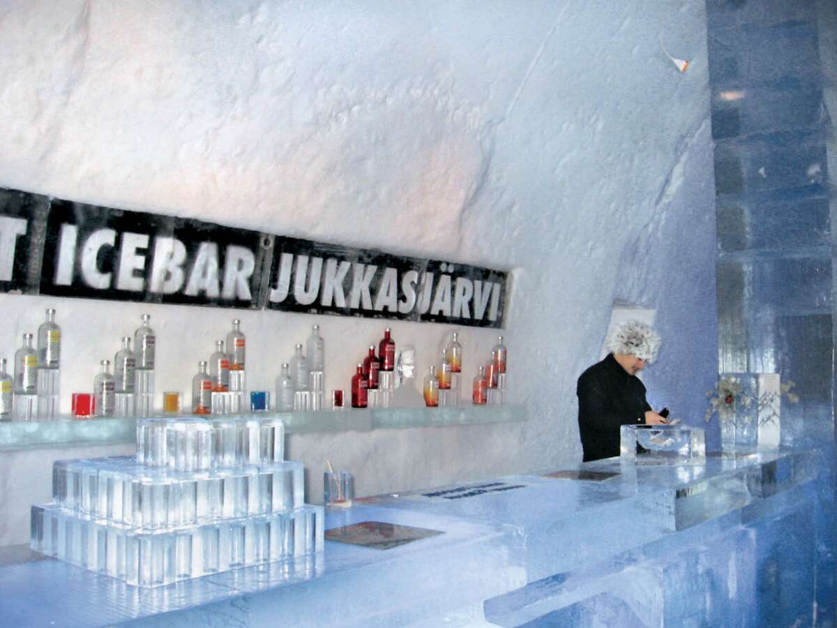A 22 percent drop in the Swedish krona against the dollar over the past year has made trips to the pricey Scandinavian country more affordable for Americans. Here, a bartender pours a drink at the Absolut Ice Bar in the Ice Hotel in Jukkasjarvi, Sweden.