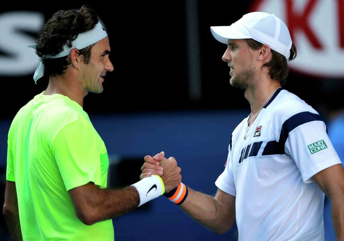 Who's the winner here? Surprisingly, it isn't Roger Federer, left, whose 11-year run of at least reaching the Aussie semifinals was ended by Andreas Seppi.