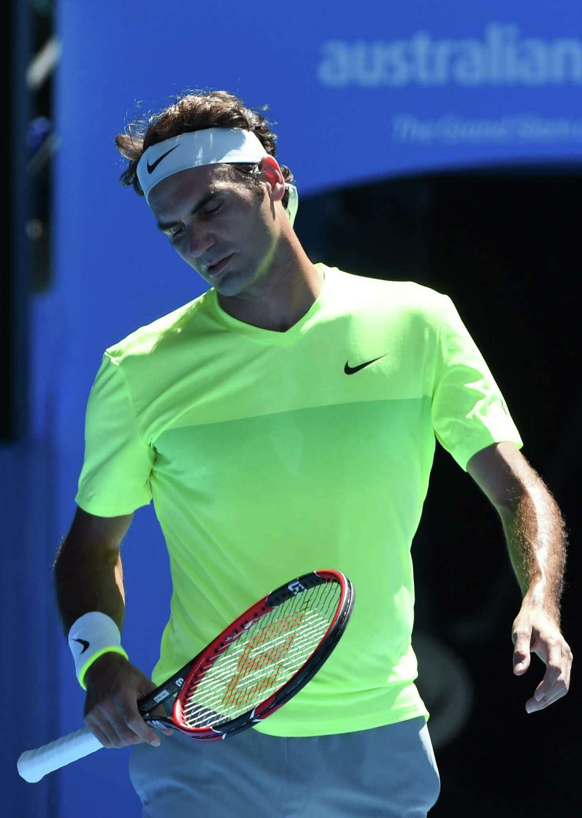 Switzerland's Roger Federer reacts during his men's singles match against Italy's Andreas Seppi on day five of the 2015 Australian Open tennis tournament in Melbourne on January 23, 2015. AFP PHOTO / MAL FAIRCLOUGH-- IMAGE RESTRICTED TO EDITORIAL USE - STRICTLY NO COMMERCIAL USEMAL FAIRCLOUGH/AFP/Getty Images