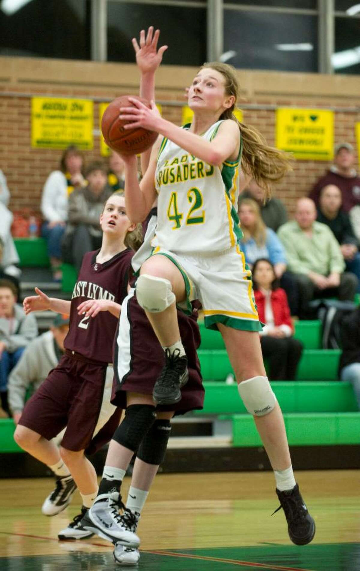 Trinity's Mackenzie Griffin shoots during the the first round of the 2010 CIAC Class L girls basketball tournament at Trinity Catholic High School in Stamford, Conn. on Monday, March 1, 2010.