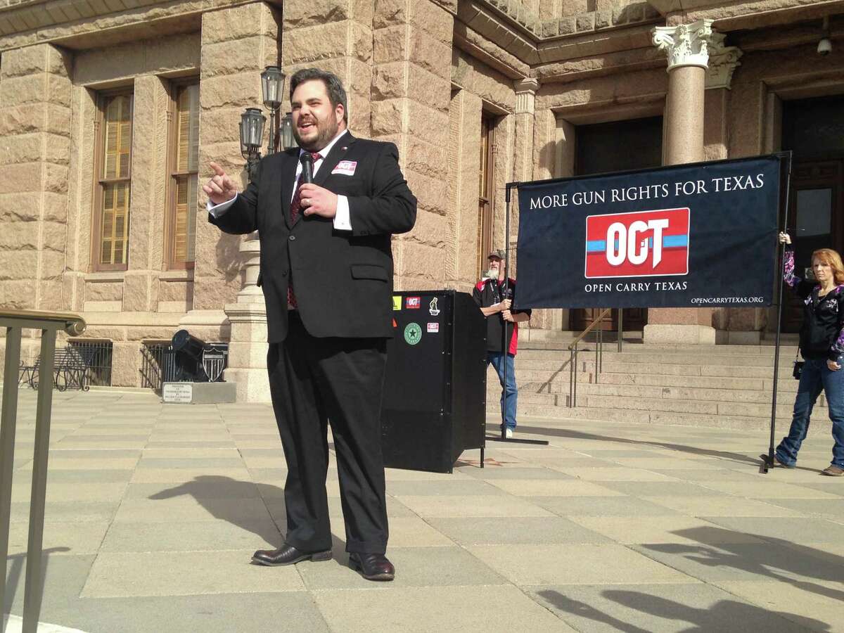 Rep. Jonathan Stickland, R-Bedford, addresses open carry activists gathered on the steps of the state Capitol in Austin on Monday, Jan. 26, 2015. The demonstrators support Rep. Jonathan Stickland's House Bill 195, which would legalize unlicensed open carry of handguns.