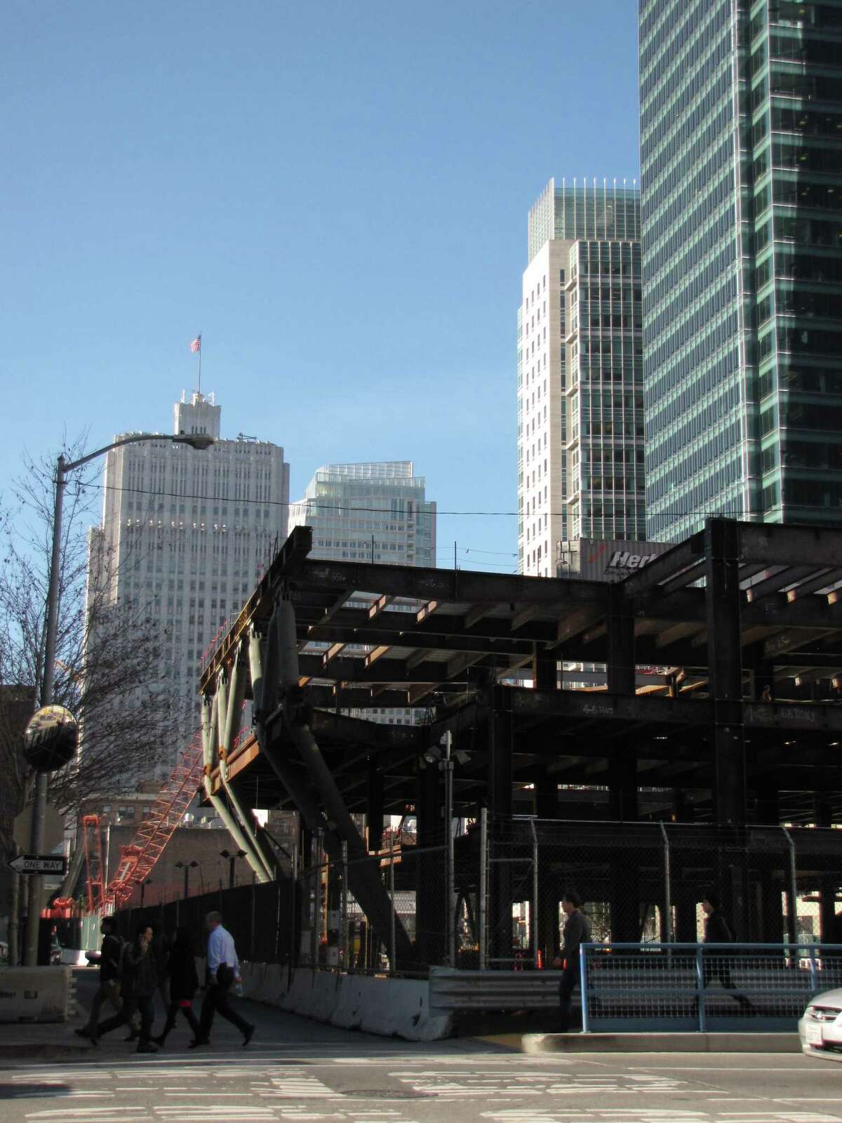 The initial above-ground sections of the new Transbay transit center as seen from First Street and Natoma alley. The target opening date is 2017.
