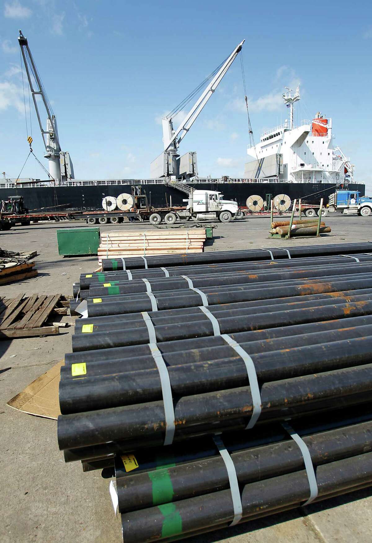 A load of steel sits on the dock at the Port of Houston, as a ship is unloaded, Wednesday, May 23, 2012, in Houston. For a Sunday centerpiece detailing the port's ambitious capital improvements program ($1.2 billion in the next five years) that it is trying to figure out how to finance because it will run out of cash by the end of next year without another bond package or alternative financing options. It is trying to get ready for the opening of a wider Panama Canal in 2014.( Karen Warren / Houston Chronicle )