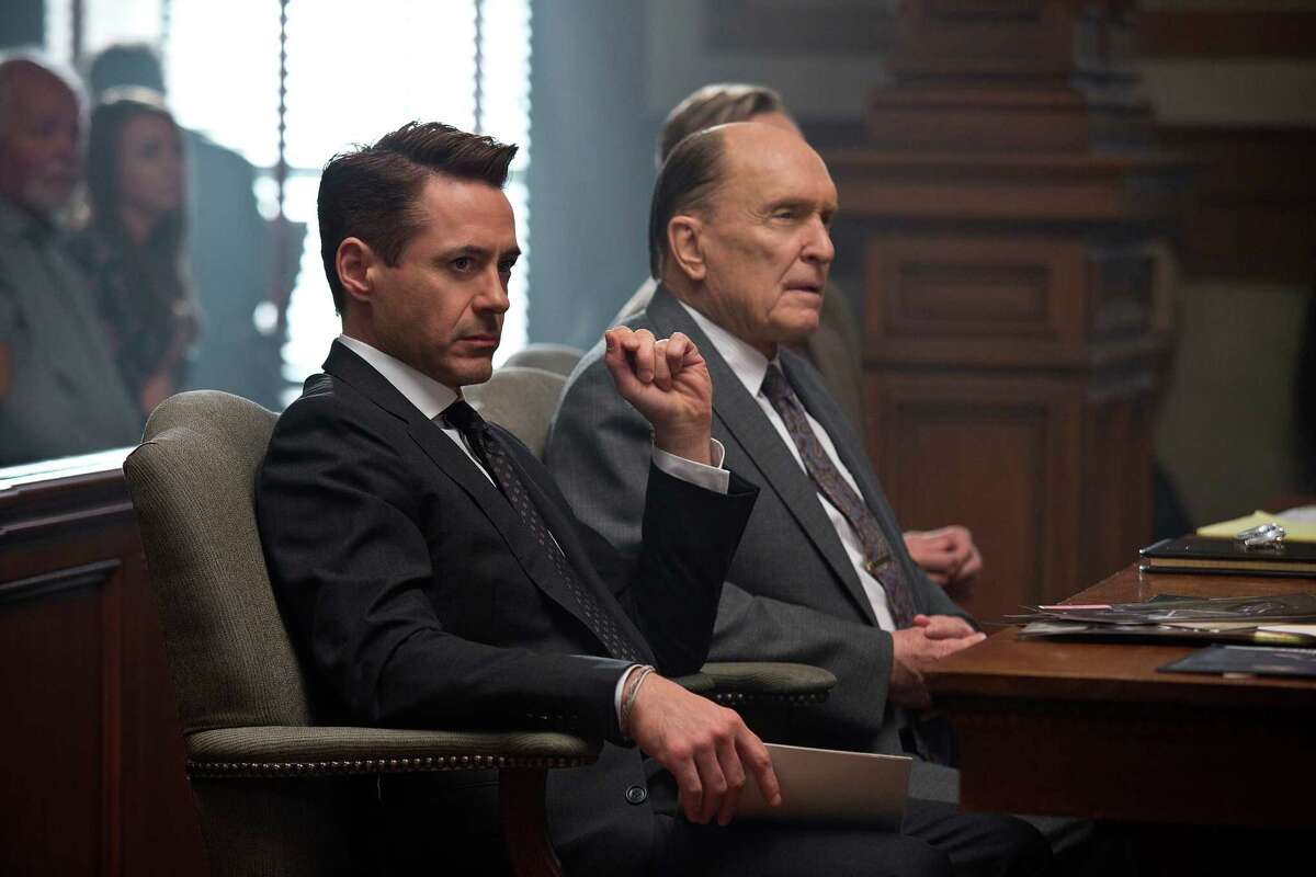 This image released by Warner Bros. Pictures shows Robert Downey Jr., left, and Robert Duvall in a scene from the film, "The Judge." (AP Photo/Warner Bros. Pictures, Claire Folger) ORG XMIT: NYET868