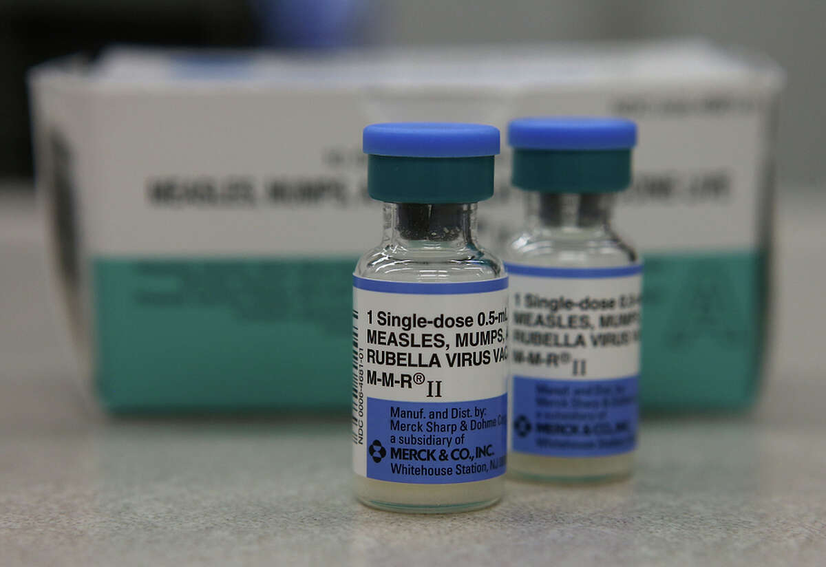 MILL VALLEY, CA - JANUARY 26: In this photo illustration, vials of measles, mumps and rubella vaccine are displayed on a counter at a Walgreens Pharmacy on January 26, 2015 in Mill Valley, California. An outbreak of measles in California has grown to 68 cases with 48 of the cases being linked to people who had visited Disneyland. Nine additional cases have been reported in five states and Mexico. (Photo by Illustration Justin Sullivan/Getty Images)