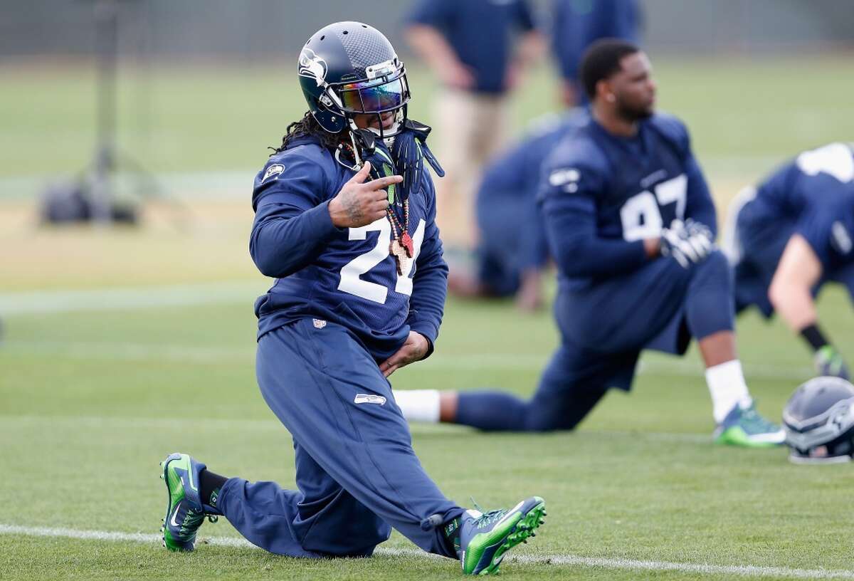 TEMPE, AZ - JANUARY 28: Running back Marshawn Lynch #24 of the Seattle Seahawks stretches during a practice at Arizona State University on January 28, 2015 in Tempe, Arizona. (Photo by Christian Petersen/Getty Images)