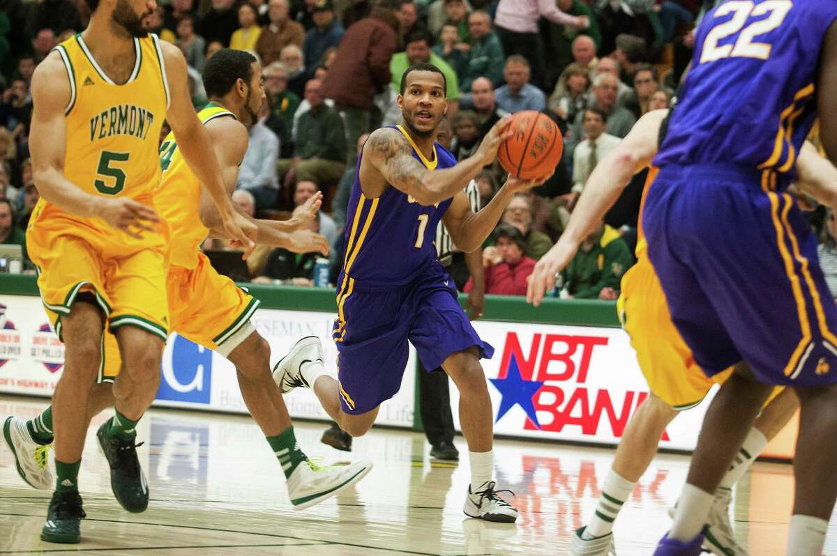 UAlbany guard Ray Sanders looks to pass the ball during a men's basketball game between the Great Danes and Vermont at Patrick Gym on Wednesday, Jan. 28, 2015, in Burlington, Vt. (Brian Jenkins / Special to the Times Union)