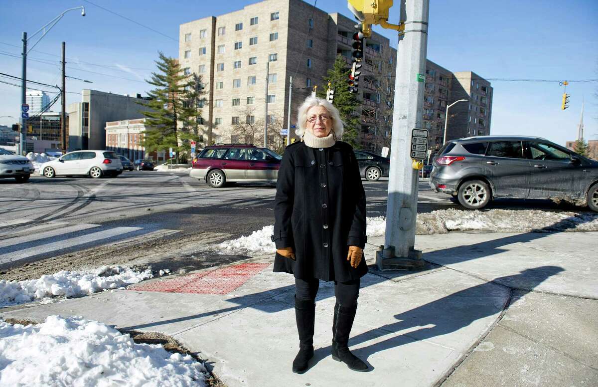 Gilda Axiotakis, 82, poses for a photo at the intersetion of Strawberry Hill Avenue and Hoyt Street in Stamford, Conn., on Thursday, January 29, 2015. Axiotakis said she walks all over the city but finds this intersection, which is right outside her apartment building, is the most dangerous for pedestrians.