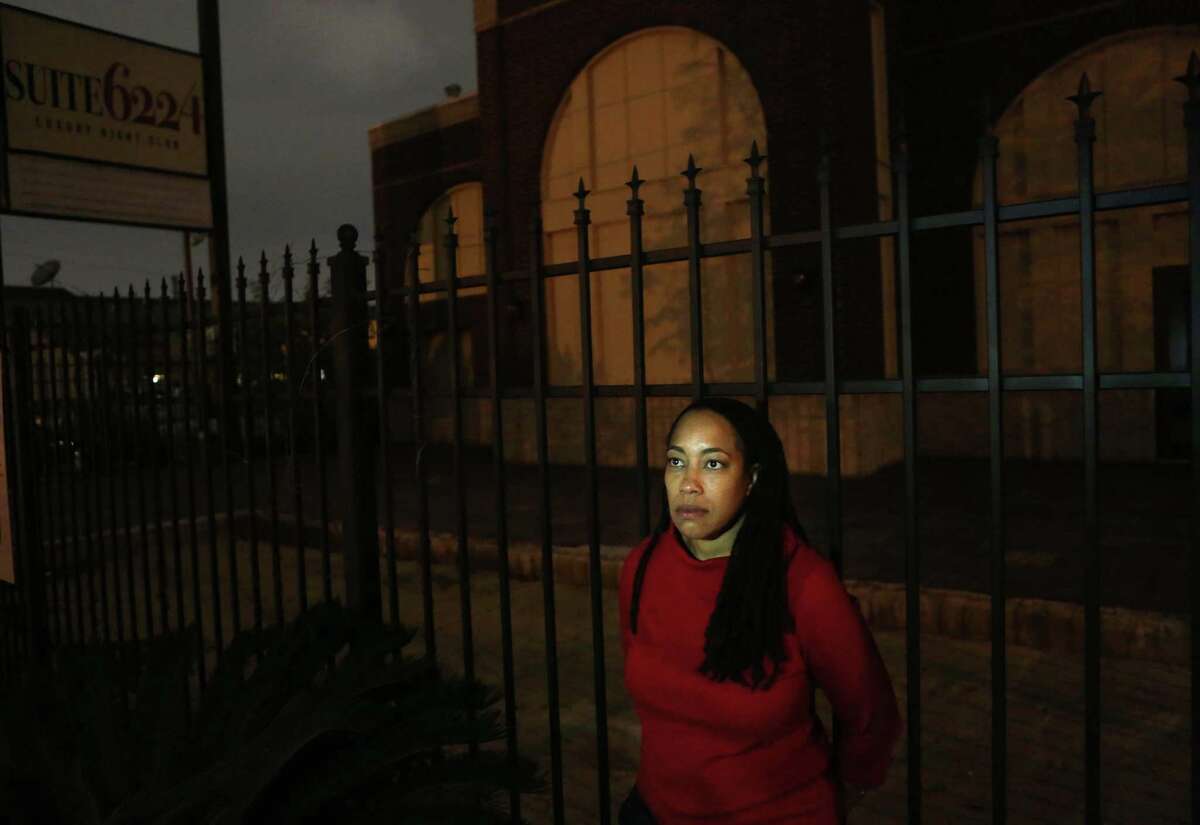 Pamela Liase, sister of Houston strip club owner Phillip Liase, stands outside the abandoned gentleman's club her brother was attempting to open before his killing in 2013. She can't understand why police have not made an arrest.