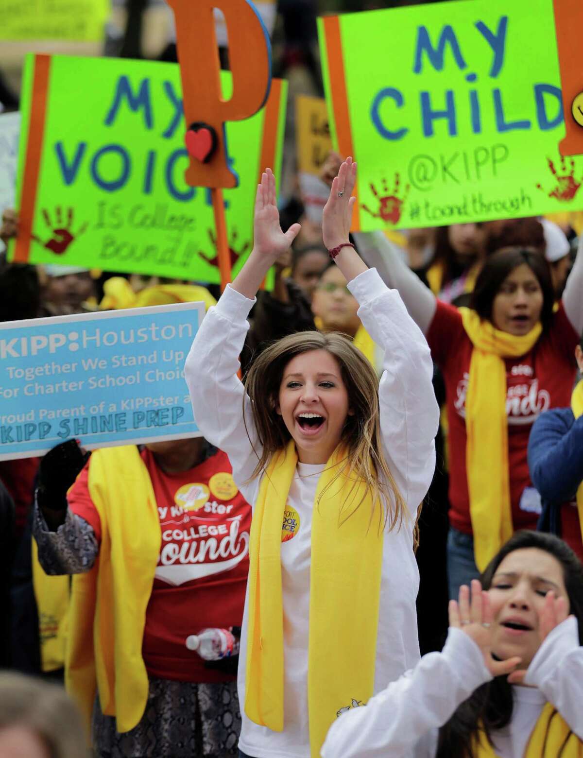 Students, teachers and supporters cheer during a school choice rally at the Texas Capitol, Friday, Jan. 30, 2015, in Austin, Texas. School choice supporters called for expanding voucher programs and charter schools statewide. (AP Photo/Eric Gay)