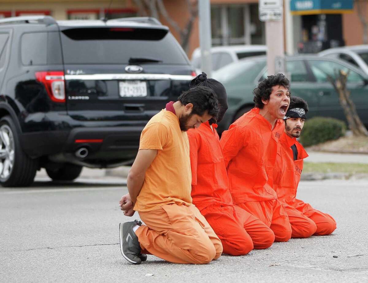 Antitorture protestors stage water board simulation