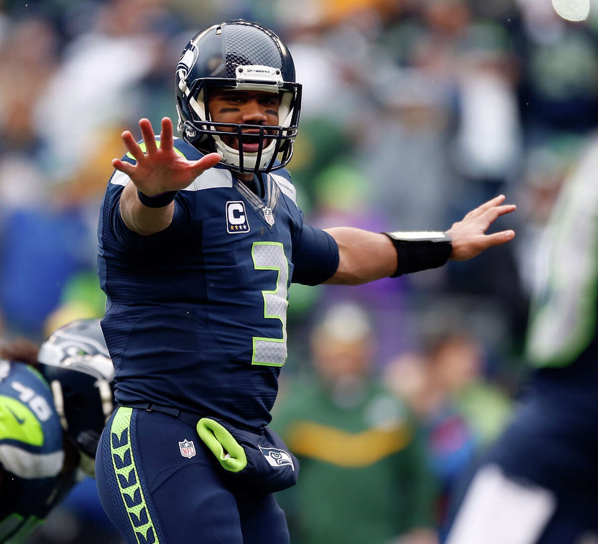 SEATTLE, WA - JANUARY 18: Russell Wilson #3 of the Seattle Seahawks calls out a play during the second half o the 2015 NFC Championship game against the Green Bay Packers at CenturyLink Field on January 18, 2015 in Seattle, Washington. (Photo by Otto Greule Jr/Getty Images)