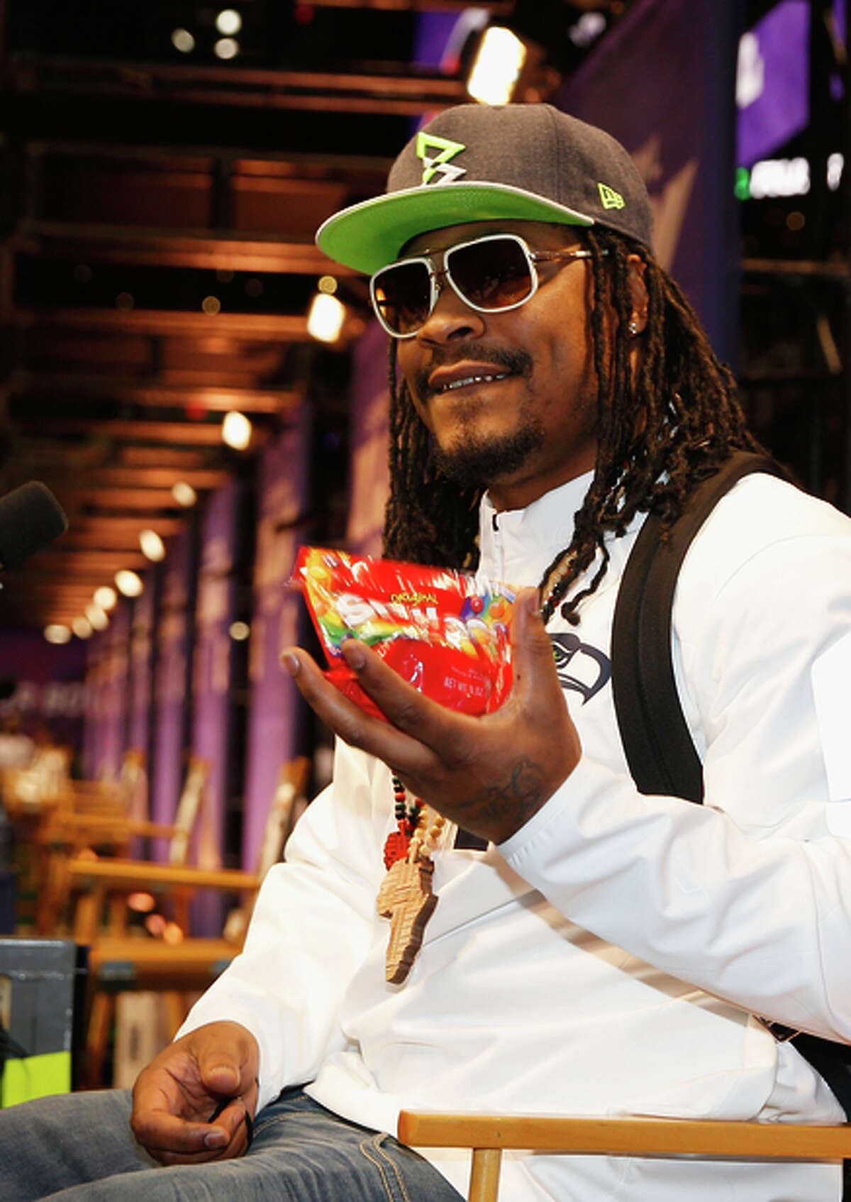 FILE -- A Skittles ad has been a sweet success for Marshawn Lynch, who has been a fan of the candy since his early football days. Skittles now has launched a limited edition version of the candy featuring Lynch on its wrapper.