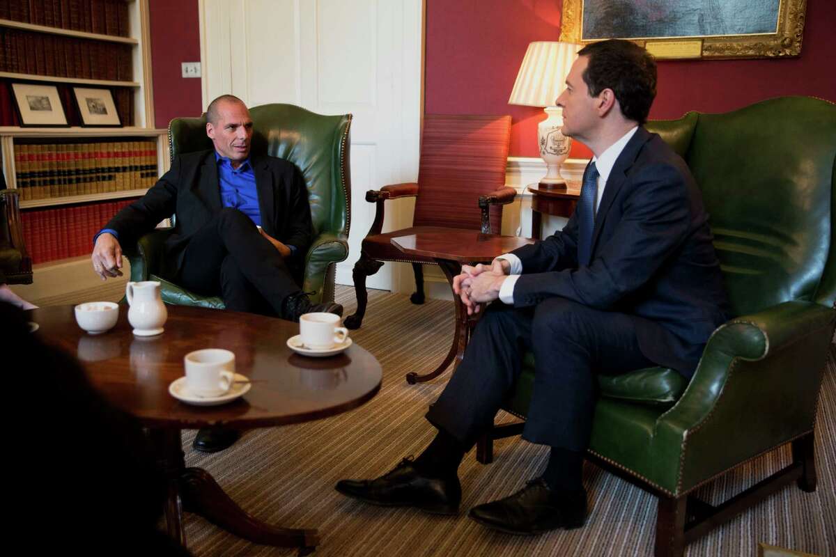 LONDON, ENGLAND - FEBRUARY 2: British Finance Minister George Osborne, (R) and Greece's new finance minister Yanis Varoufakis speak during their meeting at 11 Downing Street on February 2, 2015 in London, England. France's Socialist government offered support Sunday for Greece's efforts to renegotiate debt for its huge bailout plan, amid renewed fears about Europe's economic stability. The backing was a victory for Varoufakis as he seeks new conditions on debt from creditors who rescued Greece's economy to save the shared euro currency. (Photo by Matt Dunham - WPA Pool/Getty Images)