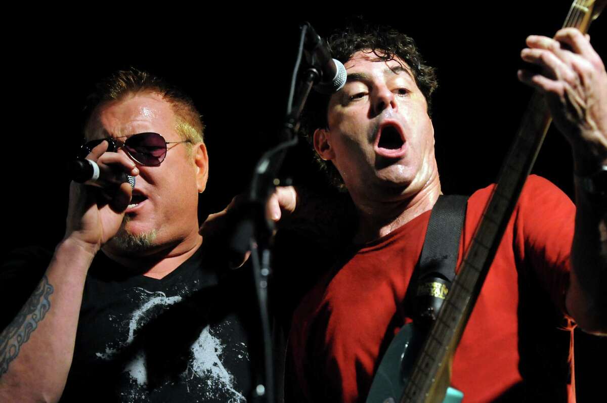 Lead singer Steve Harwell, left, performs with bassist Paul De Lisle and Smash Mouth at Alive at Five on Thursday, July 26, 2012, at Times Union Center in Albany, N.Y. (Cindy Schultz / Times Union)