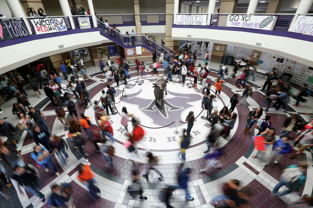 Students make their way to class in November at Morton Ranch High School in Katy. The school currently has about 3,400 students, which is 400 more than its ideal maximum. A recent bond passed in the Katy Independent School District will allow the building of a new high school to accommodate the growth in the area. ( Johnny Hanson / Houston Chronicle )