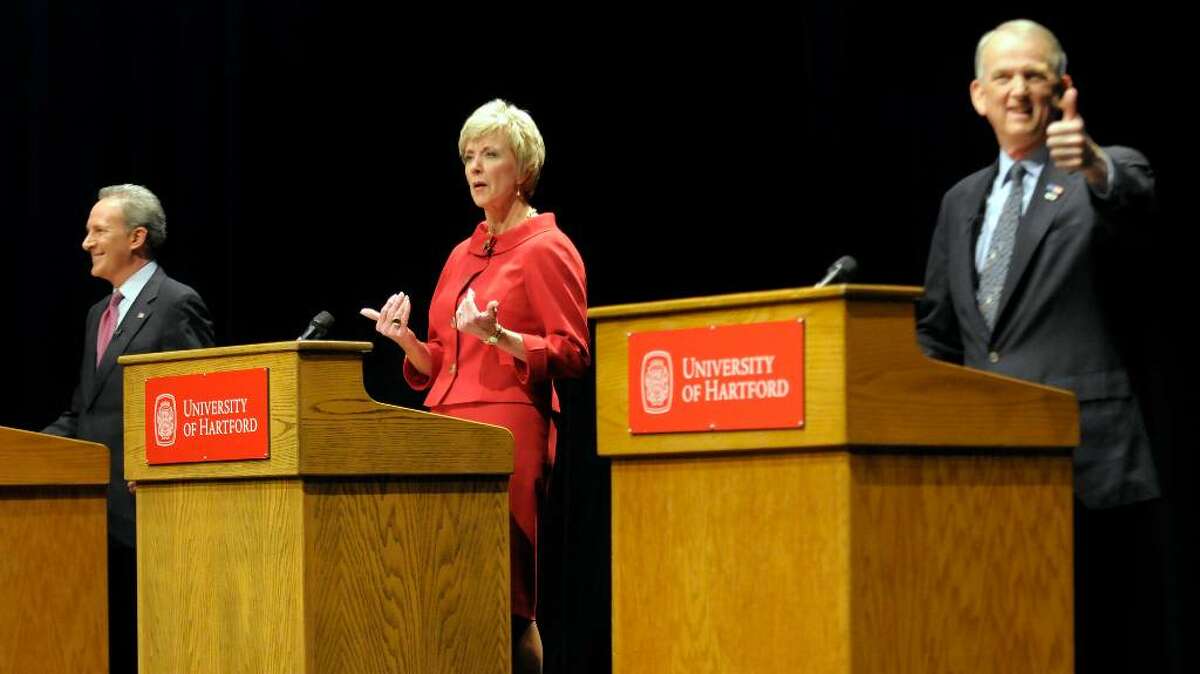 From left, Republican hopefuls for U.S. Senate, money manager Peter Schiff, former World Wrestling Entertainment CEO Linda McMahon and Former Congressman Rob Simmons, debate at the Lincoln Theater on the University of Hartford campus in West Hartford, Conn., Tuesday, March 2, 2010. (AP Photo/John Woike, Pool)